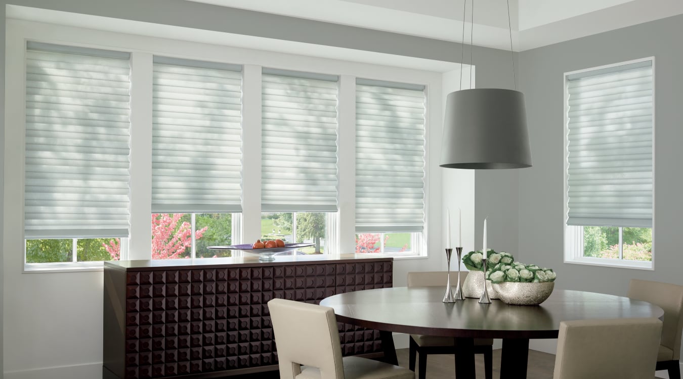 Cordless motorized shades in a San Antonio dining room